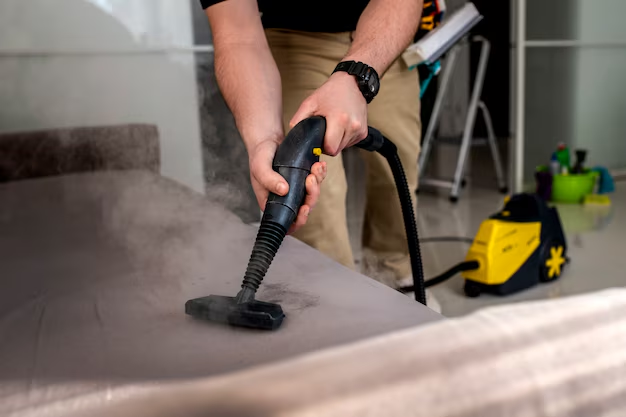 A high-performance carpet steam cleaner in action, demonstrating effective deep cleaning for home carpets.
